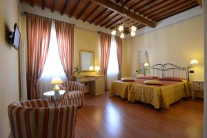 Posteľ alebo postele v izbe v ubytovaní Hotel Di Stefano
