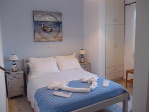 Posteľ alebo postele v izbe v ubytovaní Giasemi rooms