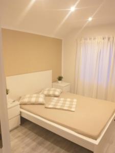 Llit o llits en una habitació de Villa ANA