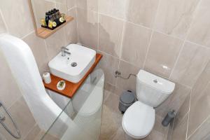 Kúpeľňa v ubytovaní Ifigenia Apartments