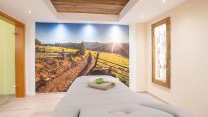 Postel nebo postele na pokoji v ubytování Biohotel Eggensberger