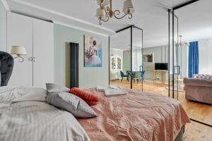 Posteľ alebo postele v izbe v ubytovaní Warzywnicza Old Town Apartment