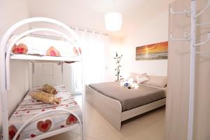 Postel nebo postele na pokoji v ubytování B&B IL TEMPONE