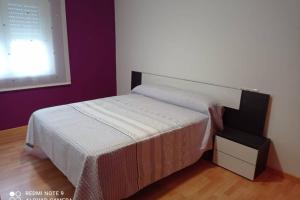 Posteľ alebo postele v izbe v ubytovaní Apartamento de 3 dormitorios en Camariñas