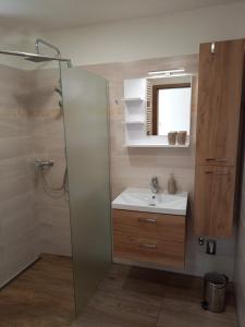 Kúpeľňa v ubytovaní Apartmány 27