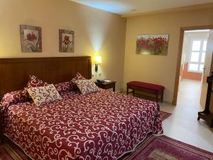Postel nebo postele na pokoji v ubytování Gran Hotel Ciudad Del Sur