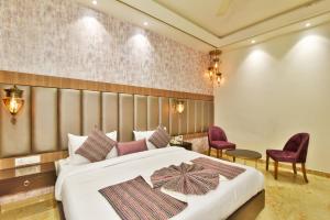 Katil atau katil-katil dalam bilik di Hotel Infa
