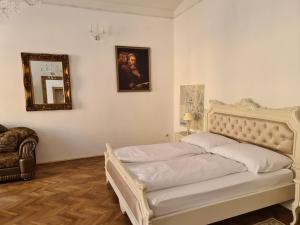En eller flere senge i et værelse på Apartmány Svätá Barborka