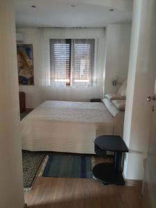 A bed or beds in a room at Sole D'oro IUN S4354
