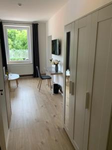 TV a/nebo společenská místnost v ubytování Apartmány LUXOR