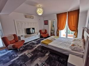 Postel nebo postele na pokoji v ubytování Vila Paun + 37 fotografií