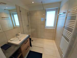 Ένα μπάνιο στο Gleiming apartments +31 φωτογραφίες