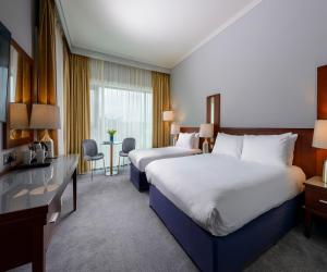 Ένα ή περισσότερα κρεβάτια σε δωμάτιο στο Shearwater Hotel & Spa