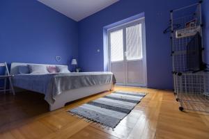 Letto o letti in una camera di Apartment Room with a view