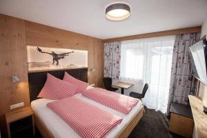 Postel nebo postele na pokoji v ubytování Haus Küchelspitz
