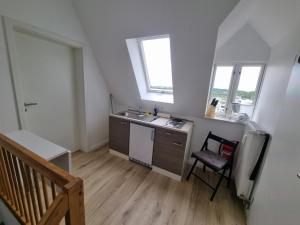 Kuchyň nebo kuchyňský kout v ubytování Nikolai Appartements
