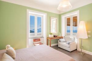 A bed or beds in a room at Casa Mariavittoria