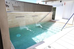 The swimming pool at or near Hotel Amadeus Sevilla
