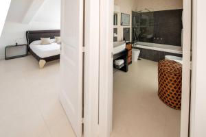 A bed or beds in a room at Casa Mariavittoria