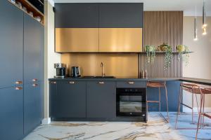 Kuchyňa alebo kuchynka v ubytovaní Apartament Golden Rose