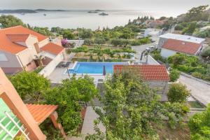 an aerial view of a house with a swimming pool at Apartmani Ana in Mlini