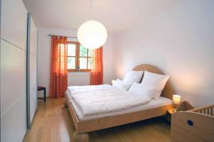 Postel nebo postele na pokoji v ubytování Ferienwohnung Miedl