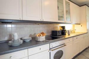 Kuchyň nebo kuchyňský kout v ubytování Ferienwohnung Miedl