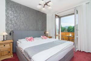 Postel nebo postele na pokoji v ubytování Relax Kycera