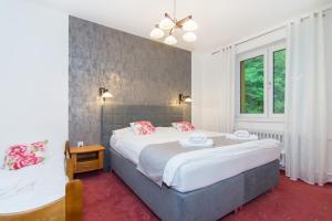 Postel nebo postele na pokoji v ubytování Relax Kycera