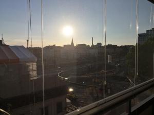 a view of a city from an office window at Central Tammela 80m2 in Tampere