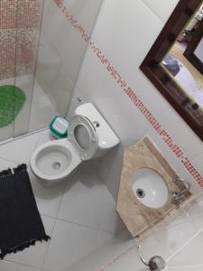 Ένα μπάνιο στο Aluguel temporário