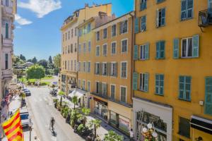 a view of a street in a city with buildings at SUEDE AP4207 by Riviera Holiday Homes in Nice