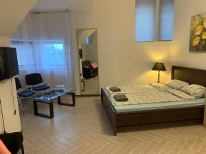 Postel nebo postele na pokoji v ubytování Rotermanni Studio Apartament on 4 floor