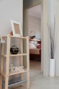 Postel nebo postele na pokoji v ubytování Marilena Apartments