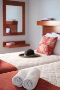 Postel nebo postele na pokoji v ubytování Marilena Apartments