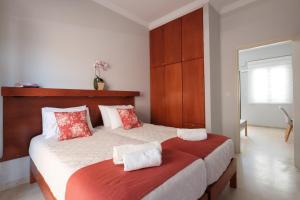 Postel nebo postele na pokoji v ubytování Marilena Apartments