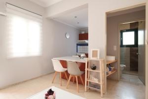Kuchyň nebo kuchyňský kout v ubytování Marilena Apartments