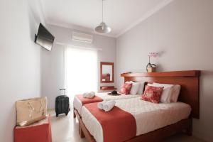 TV a/nebo společenská místnost v ubytování Marilena Apartments