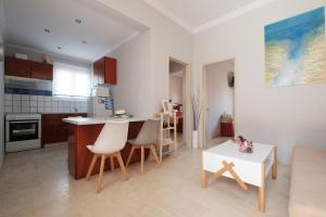 Kuchyň nebo kuchyňský kout v ubytování Marilena Apartments