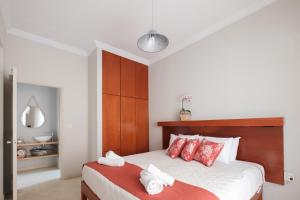 Postel nebo postele na pokoji v ubytování Marilena Apartments