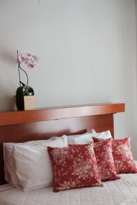 Postel nebo postele na pokoji v ubytování Marilena Apartments