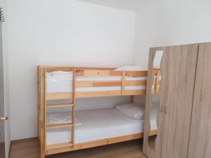 Postel nebo postele na pokoji v ubytování Apartment Smiley