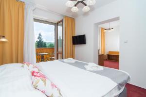 Postel nebo postele na pokoji v ubytování Relax Kycera