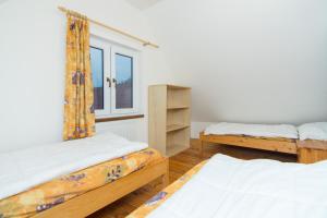 Postel nebo postele na pokoji v ubytování Relax Kycera