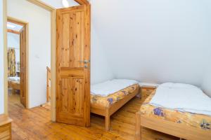Postel nebo postele na pokoji v ubytování Relax Kycera
