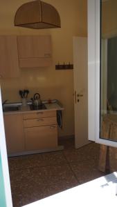 a kitchen with a sink and a counter top at Bed&BluUp in Savona +22 photos