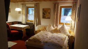 Postel nebo postele na pokoji v ubytování Kieslinger Hilde