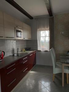 A kitchen or kitchenette at Villa Garden