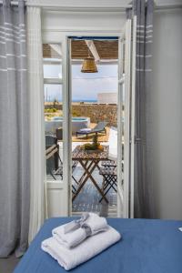 Postel nebo postele na pokoji v ubytování Punda Villas Paros