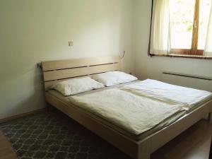 Postel nebo postele na pokoji v ubytování Haus Im Grünen